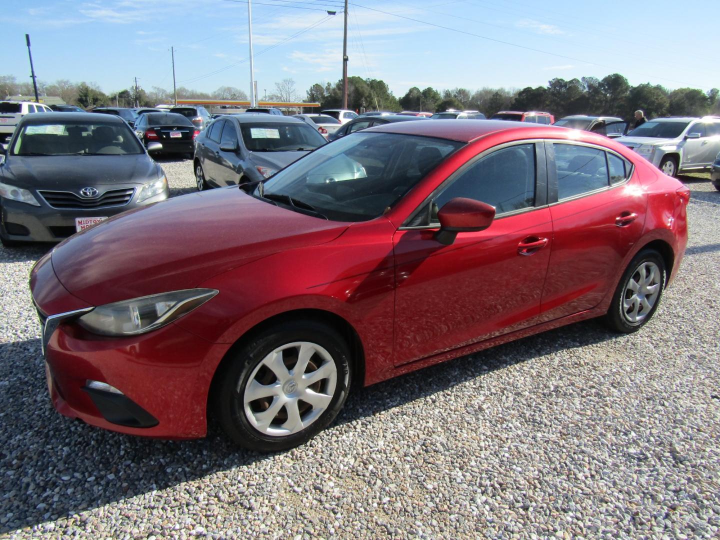 2016 Red Mazda MAZDA3 i Sport AT 4-Door (JM1BM1T74G1) with an 2.0L L4 DOHC 16V engine, Automatic transmission, located at 15016 S Hwy 231, Midland City, AL, 36350, (334) 983-3001, 31.306210, -85.495277 - Photo#2